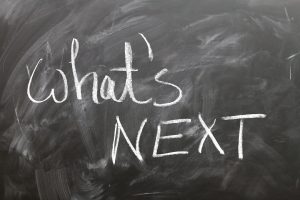 Chalkboard with the words "What's Next"